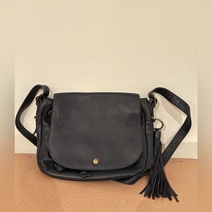 Navy blue pebble leather Lucky Brand crossbody bag with tassle